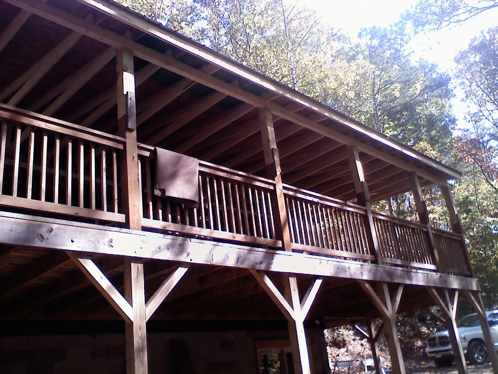 Timber framing under a new elevated porch and deck — Roof Leak Repair in Thorsby by Roofing Brothers